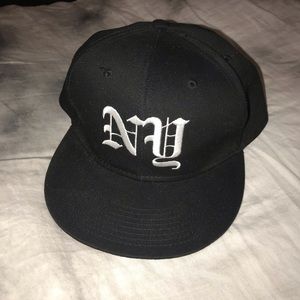 black snapback with white embroider logo
